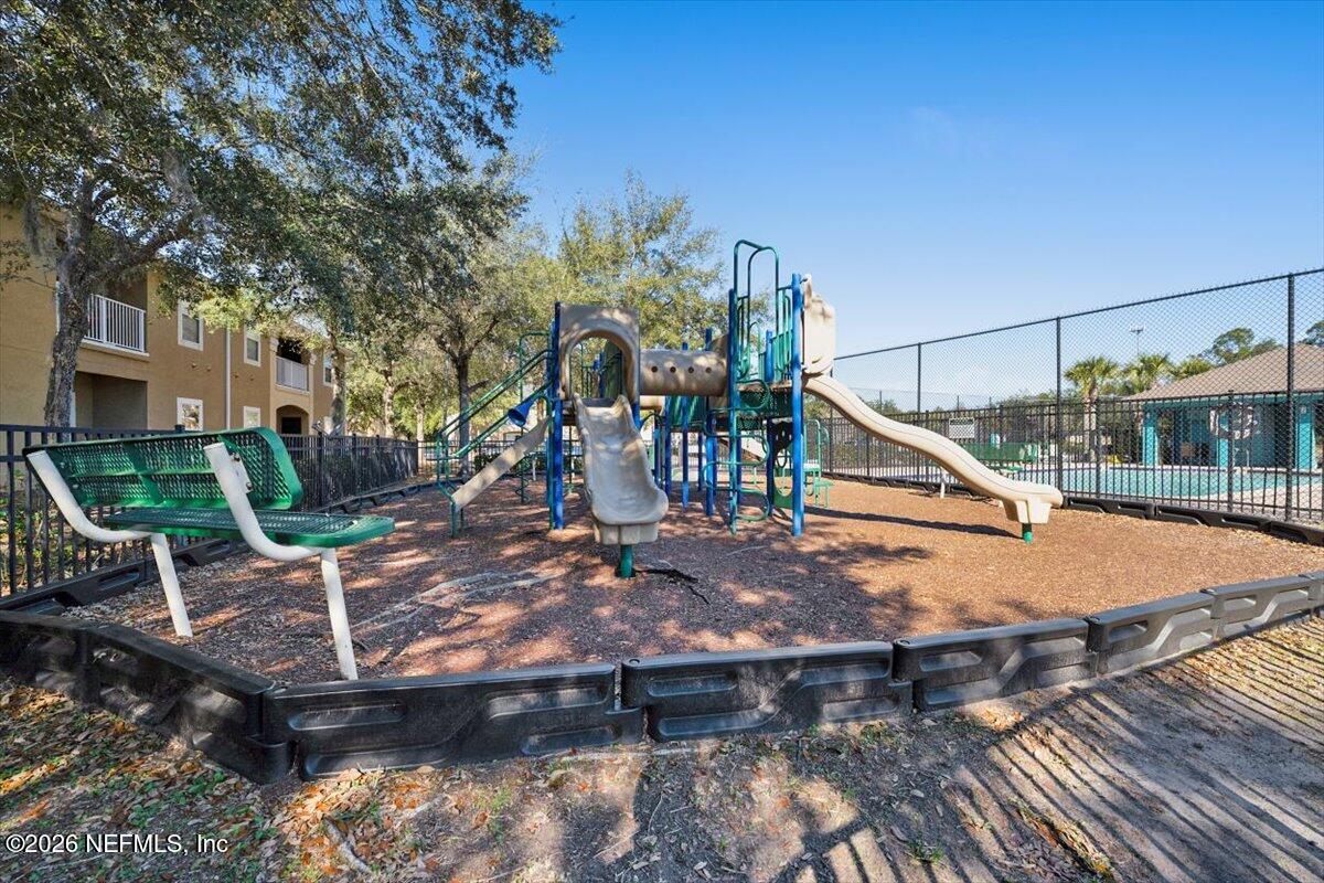 3641 Kirkpatrick Circle, Unit 141 Jacksonville, FL 32210 - Photo 24 of 25 a view of a house with backyard