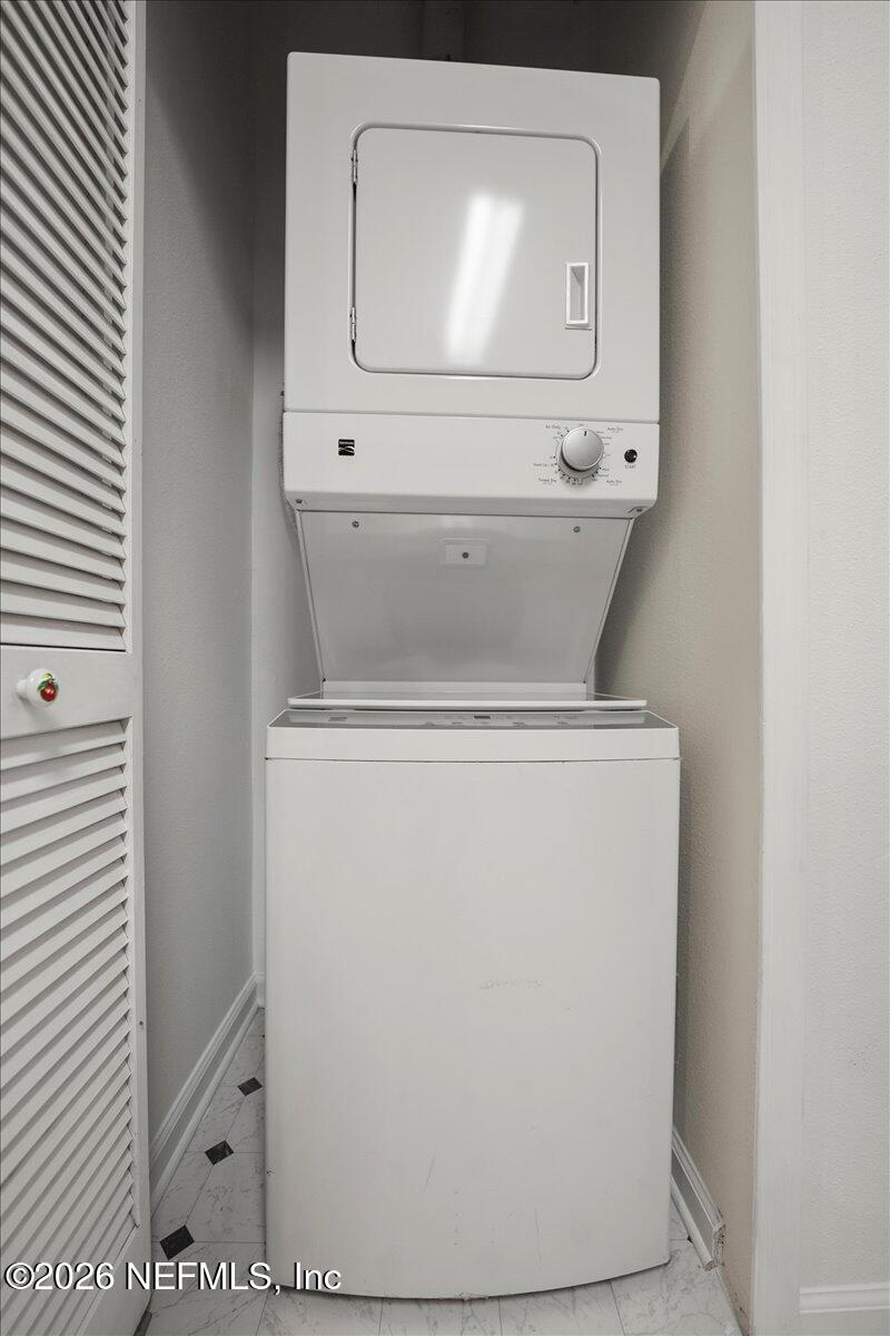 3641 Kirkpatrick Circle, Unit 141 Jacksonville, FL 32210 - Photo 7 of 25 a view of washer and dryer