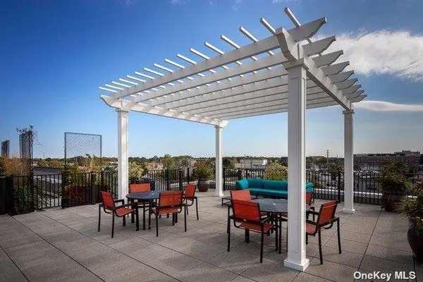 a view of a tables and chairs in patio