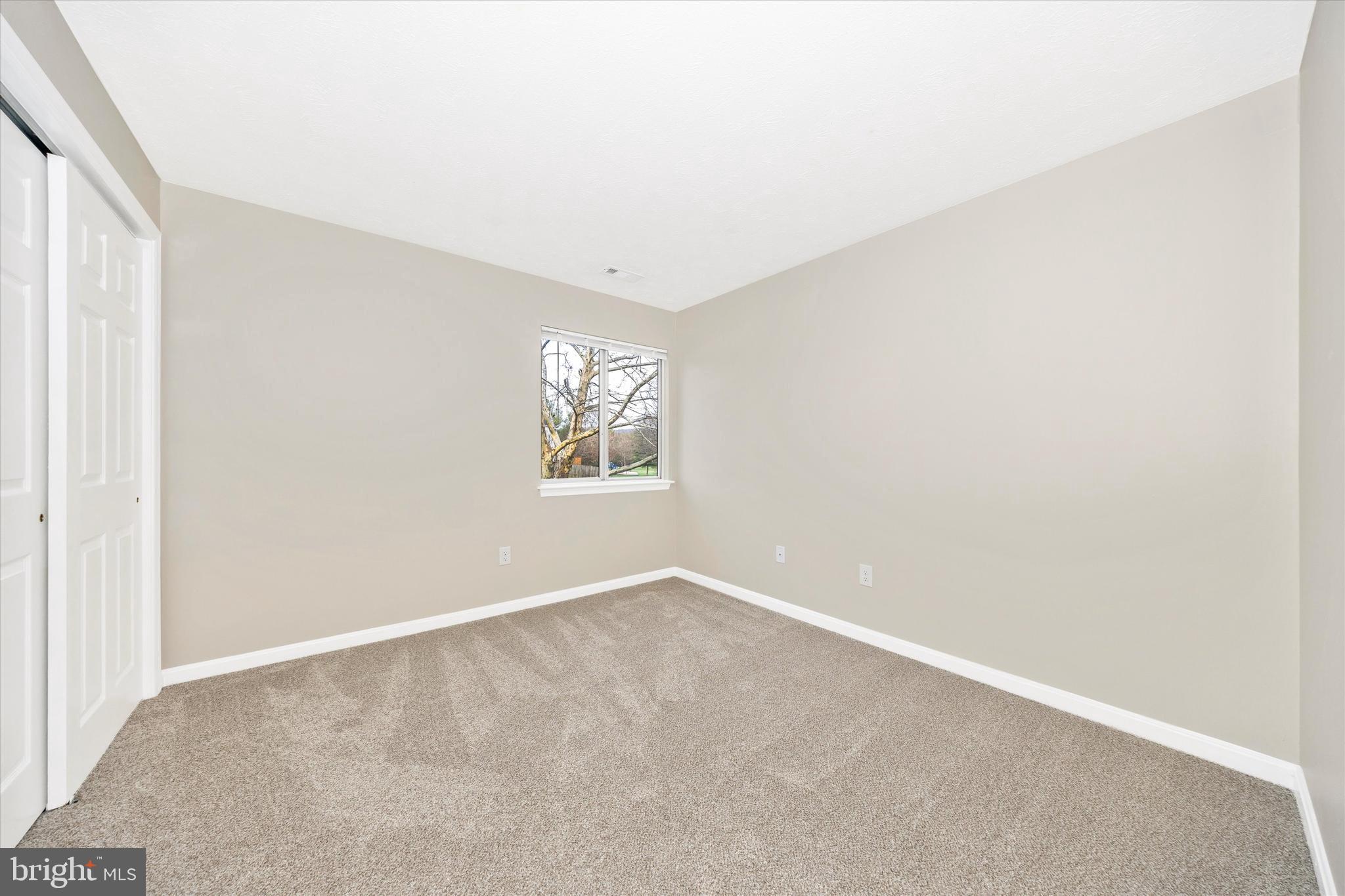 2112 Whitehall Road, Unit 1C Frederick, MD 21702 - Photo 22 of 33 an empty room with windows