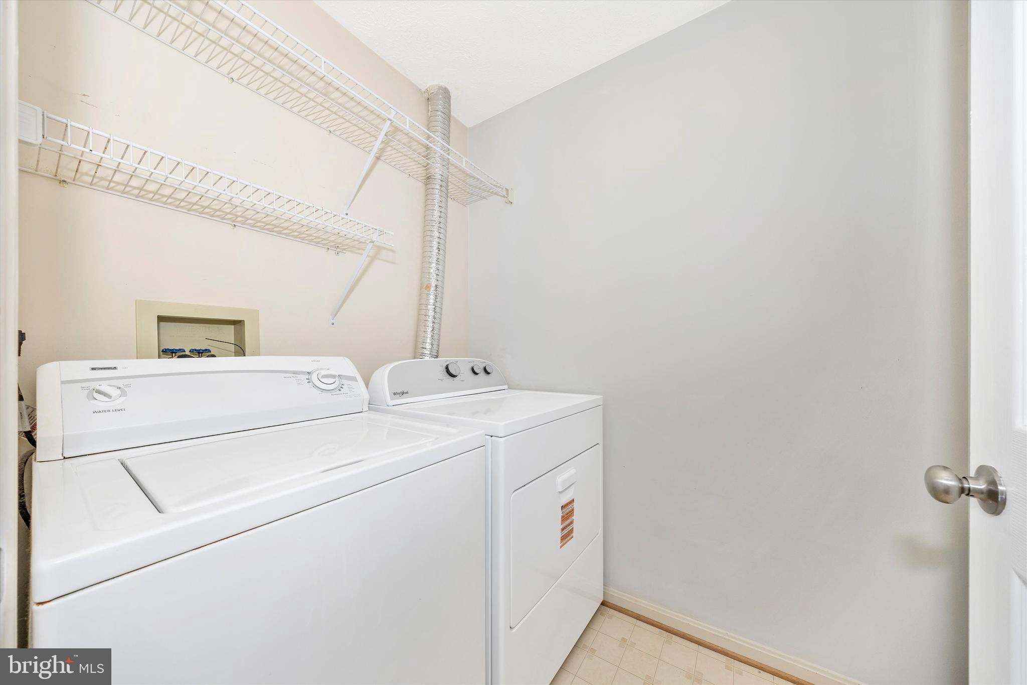 2112 Whitehall Road, Unit 1C Frederick, MD 21702 - Photo 26 of 33 a utility room with dryer and washer