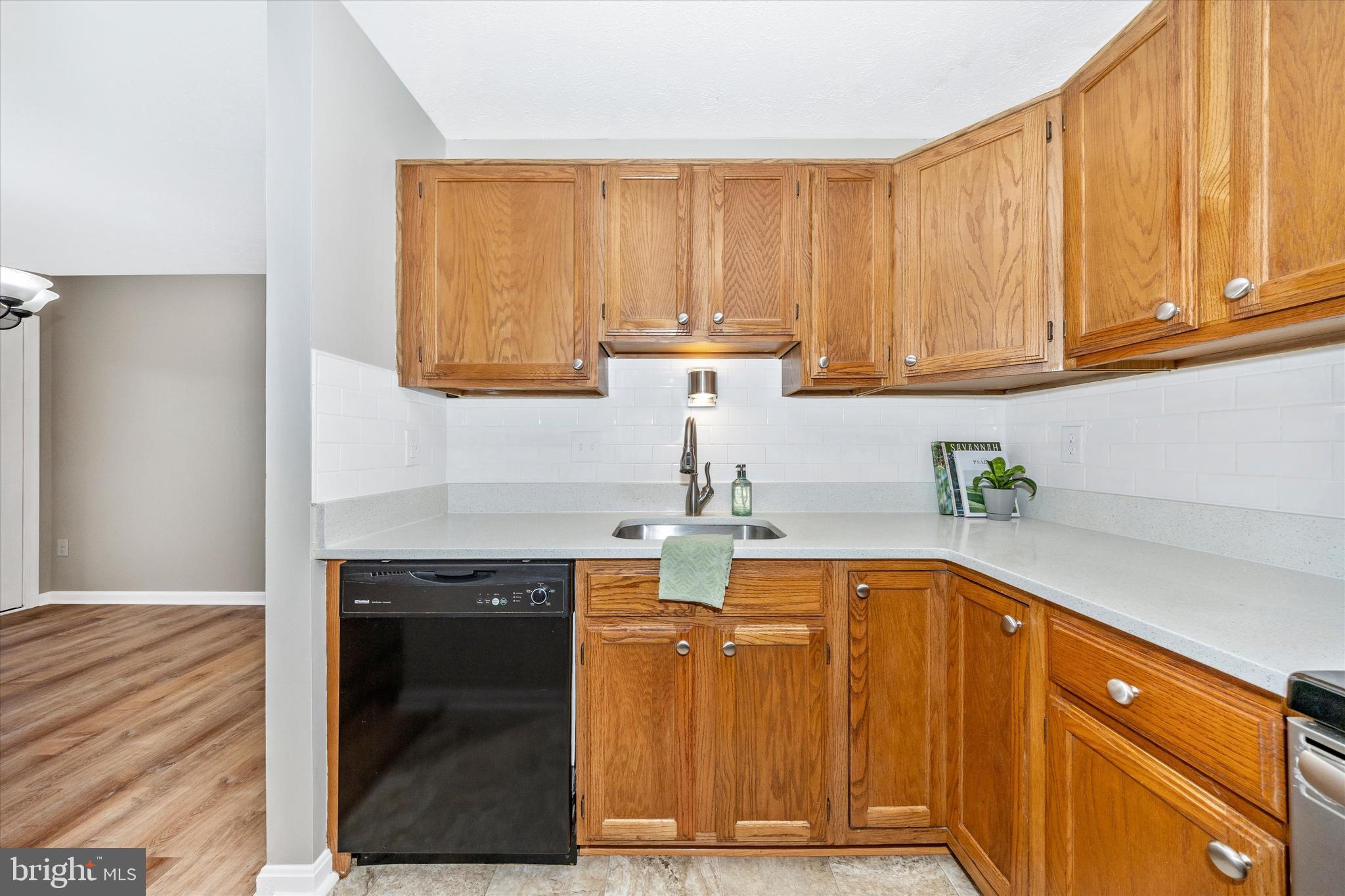 2112 Whitehall Road, Unit 1C Frederick, MD 21702 - Photo 10 of 33 a kitchen with a sink and cabinets