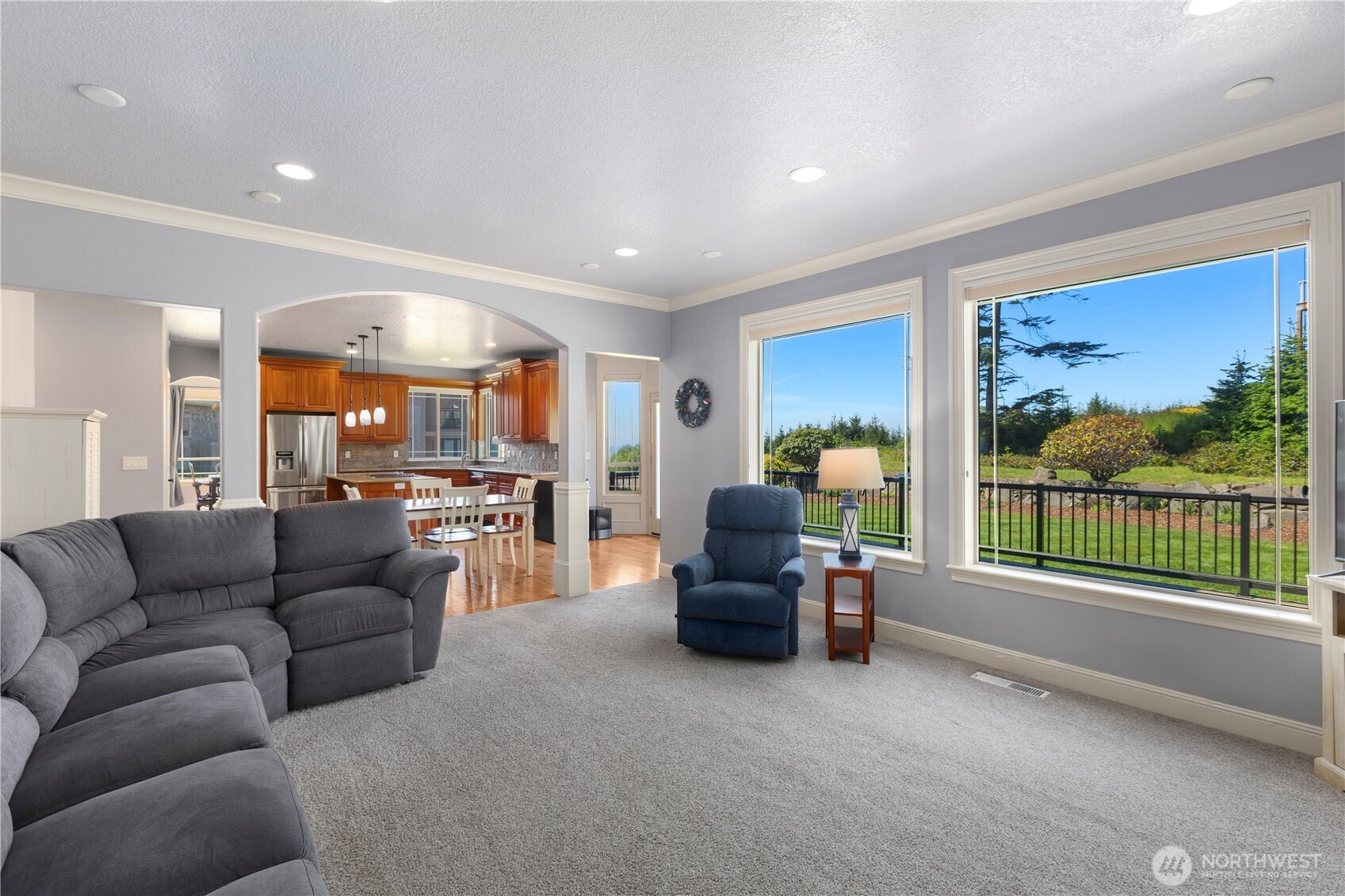 3015 Lighthouse Keepers Road Ilwaco, WA 98624 - Photo 16 of 40 a living room with furniture and a flat screen tv
