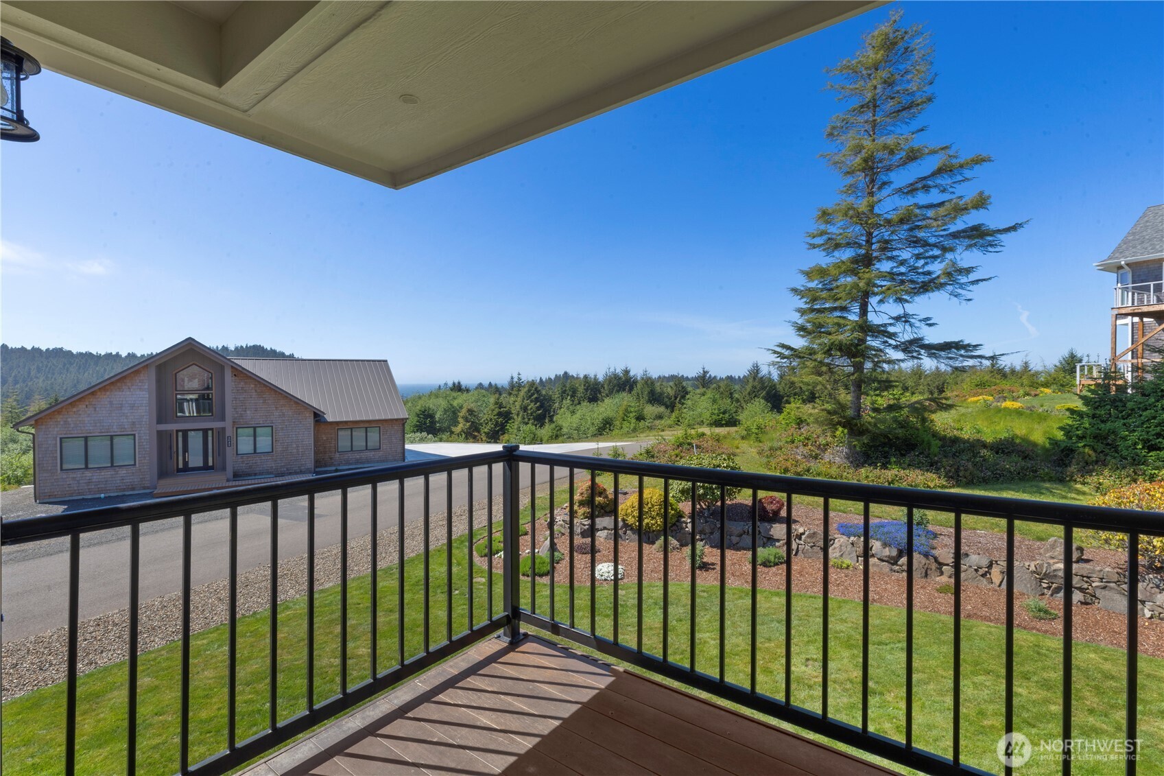 3015 Lighthouse Keepers Road Ilwaco, WA 98624 - Photo 21 of 40 a view of a street from a balcony