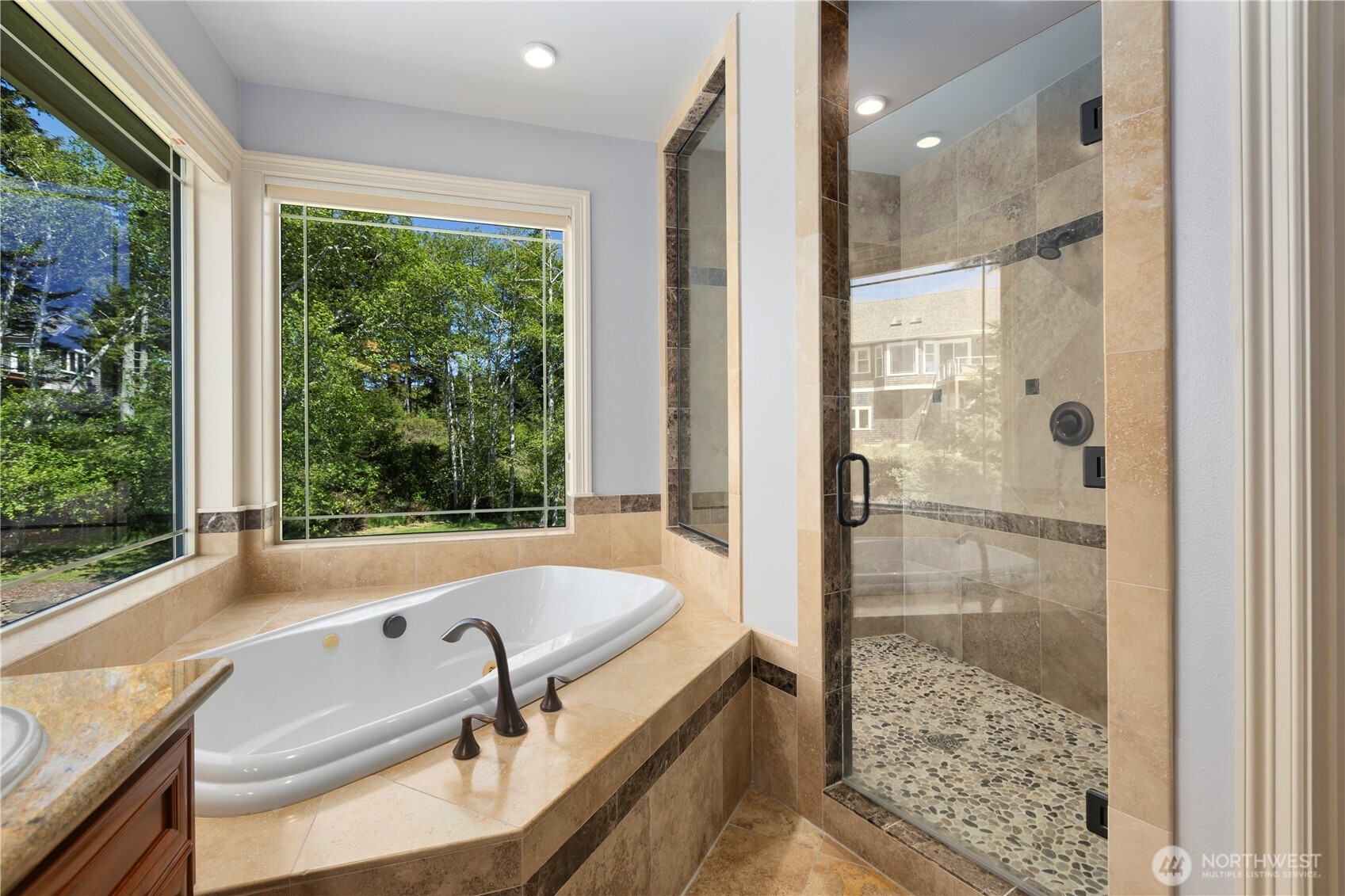 3015 Lighthouse Keepers Road Ilwaco, WA 98624 - Photo 23 of 40 a bathroom with a tub and shower