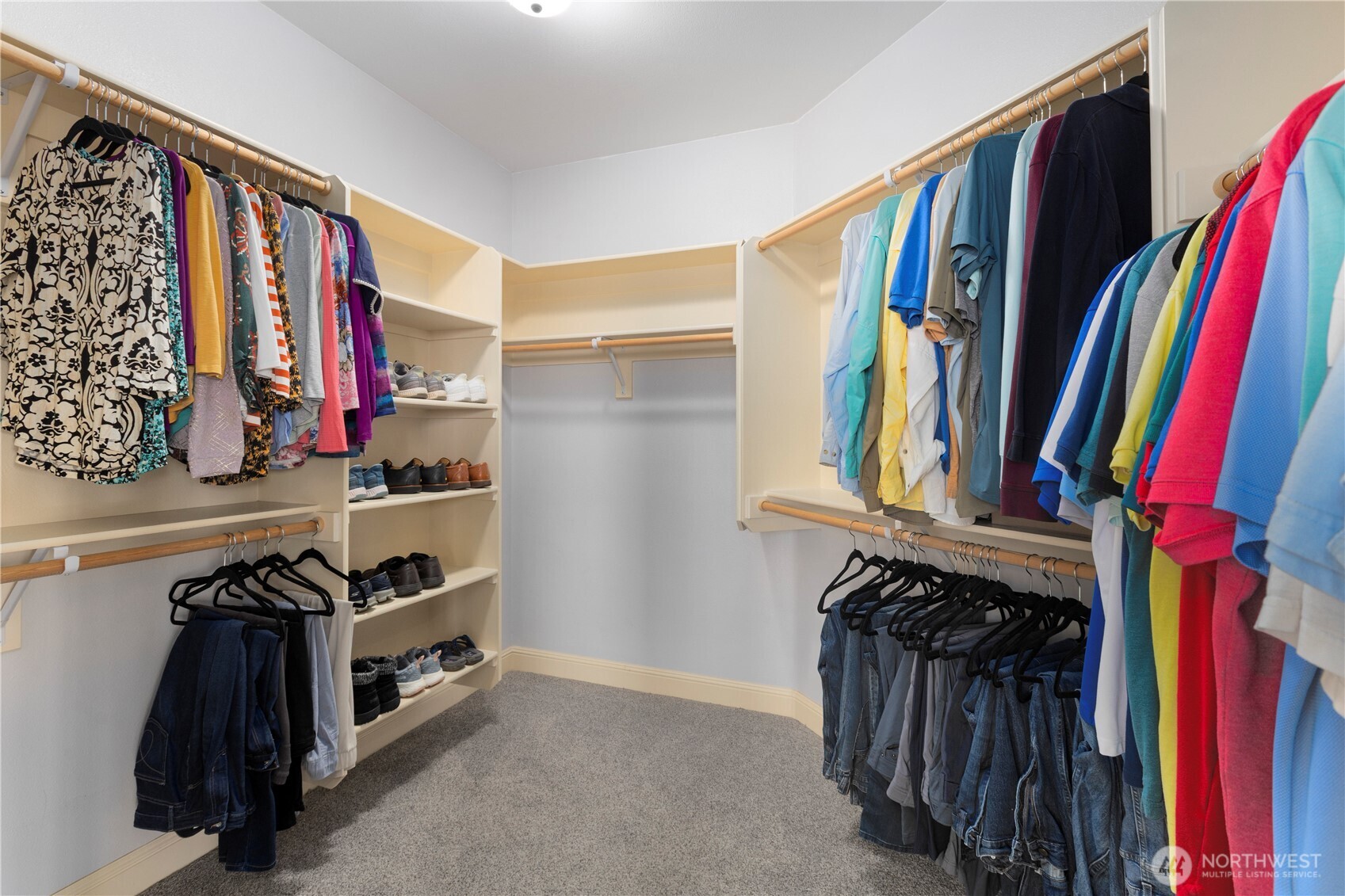 3015 Lighthouse Keepers Road Ilwaco, WA 98624 - Photo 24 of 40 a view of walk in closet with clothes and shoes