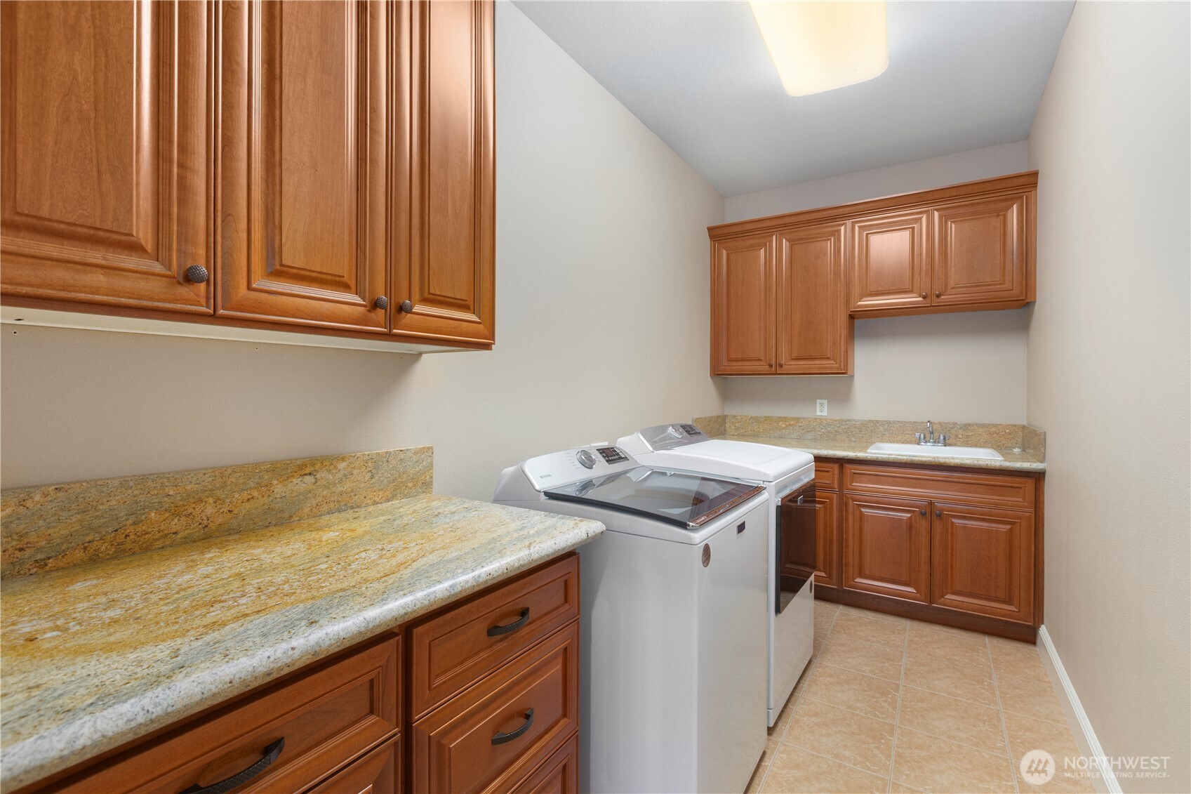 3015 Lighthouse Keepers Road Ilwaco, WA 98624 - Photo 35 of 40 a utility room with sink dryer and washer