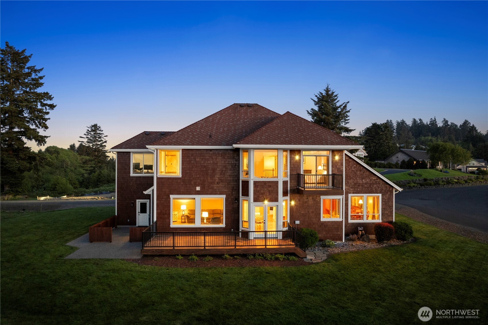 3015 Lighthouse Keepers Road Ilwaco, WA 98624 - Photo 37 of 40 a view of a brick house with a yard