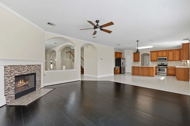 a view of a kitchen with furniture and a fireplace