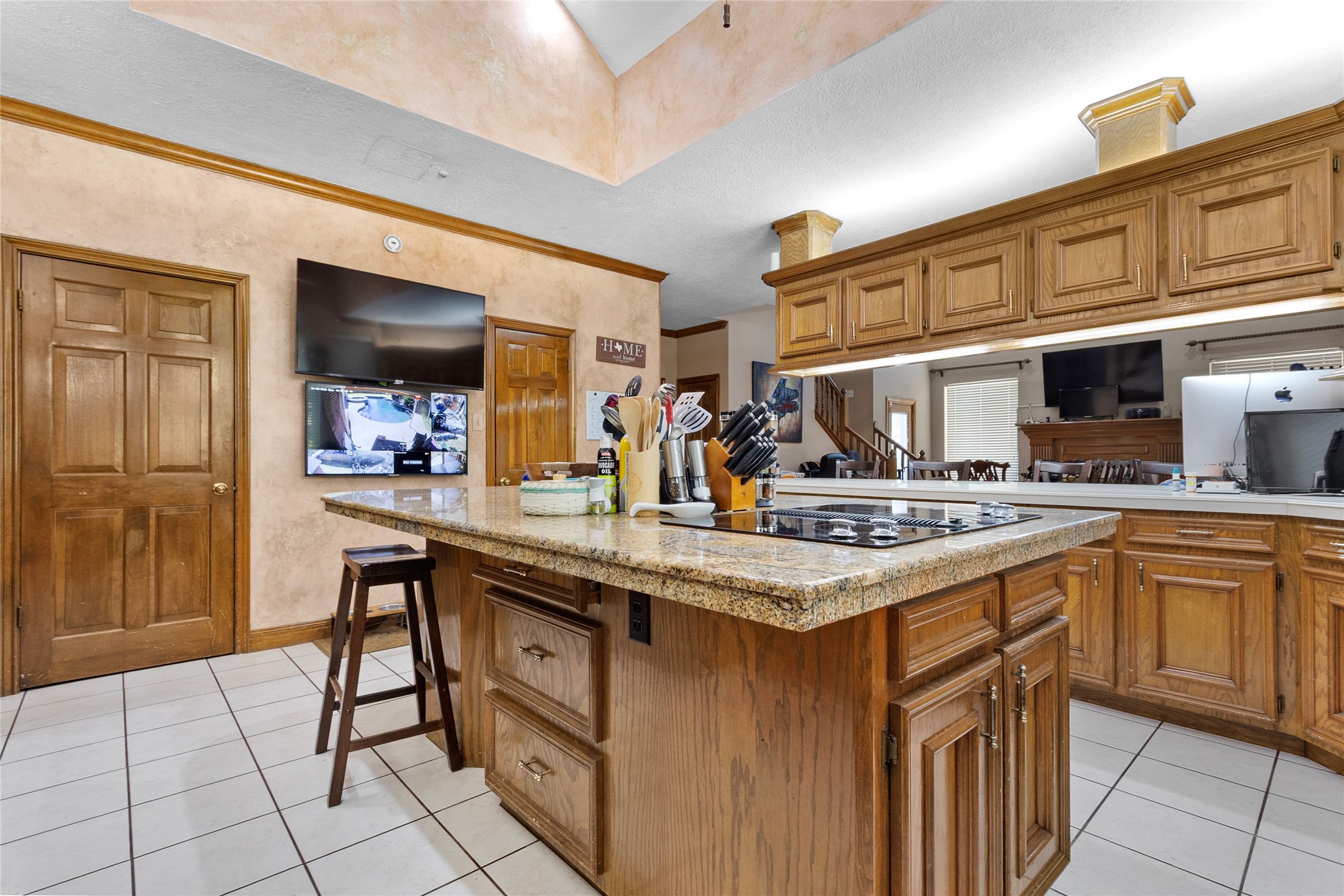 14907 Pine Point Court Houston, TX 77070 - Photo 12 of 33 a kitchen with stainless steel appliances granite countertop a sink and cabinets