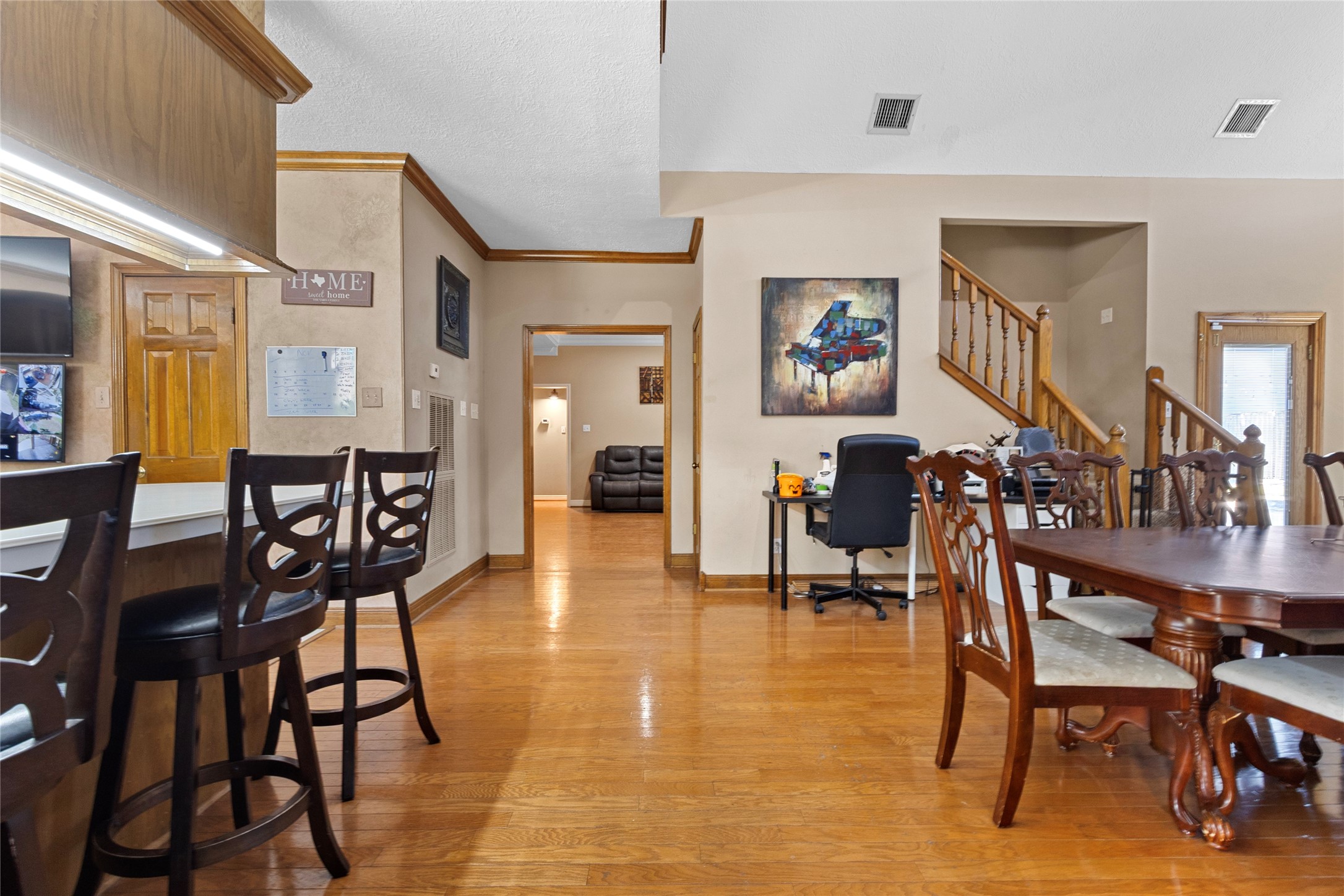 14907 Pine Point Court Houston, TX 77070 - Photo 14 of 33 a living room with lots of furniture and a wooden floor
