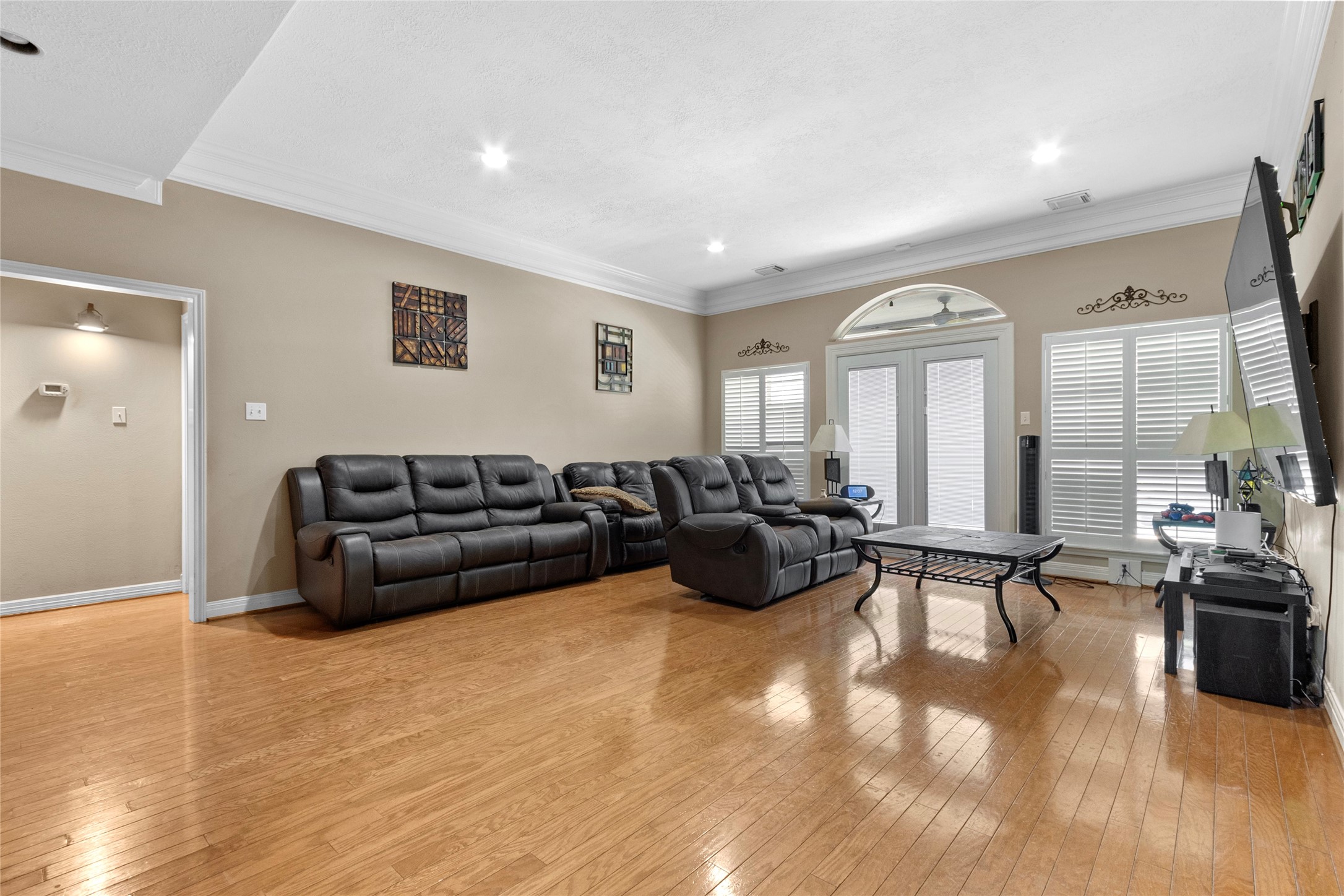 14907 Pine Point Court Houston, TX 77070 - Photo 16 of 33 a living room with furniture window and wooden floor