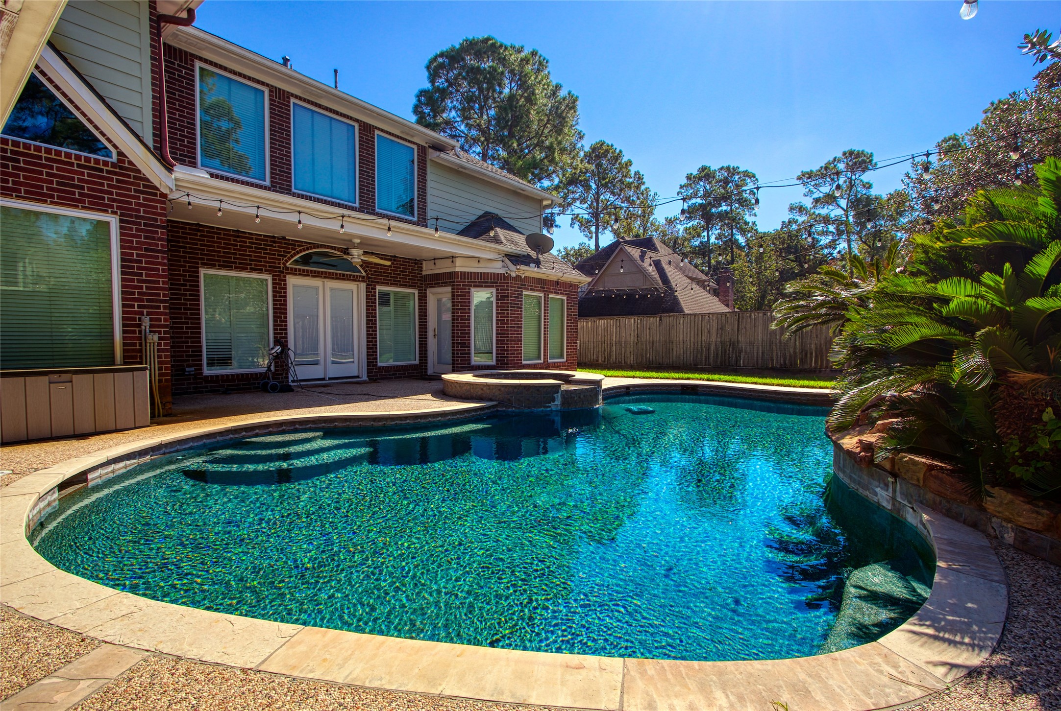 14907 Pine Point Court Houston, TX 77070 - Photo 3 of 33 a view of a backyard with swimming pool