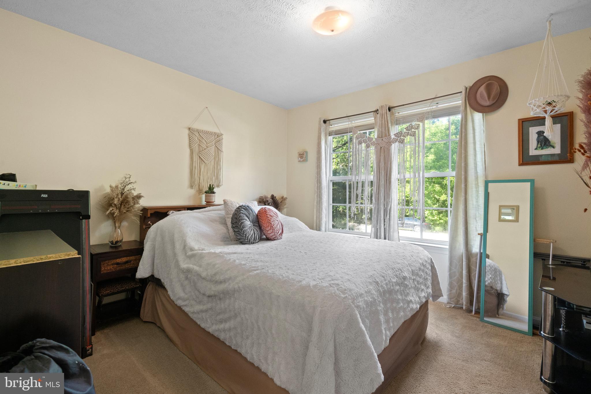 1127 Garner Drive King George, VA 22485 - Photo 14 of 39 a bedroom with a bed and a large window