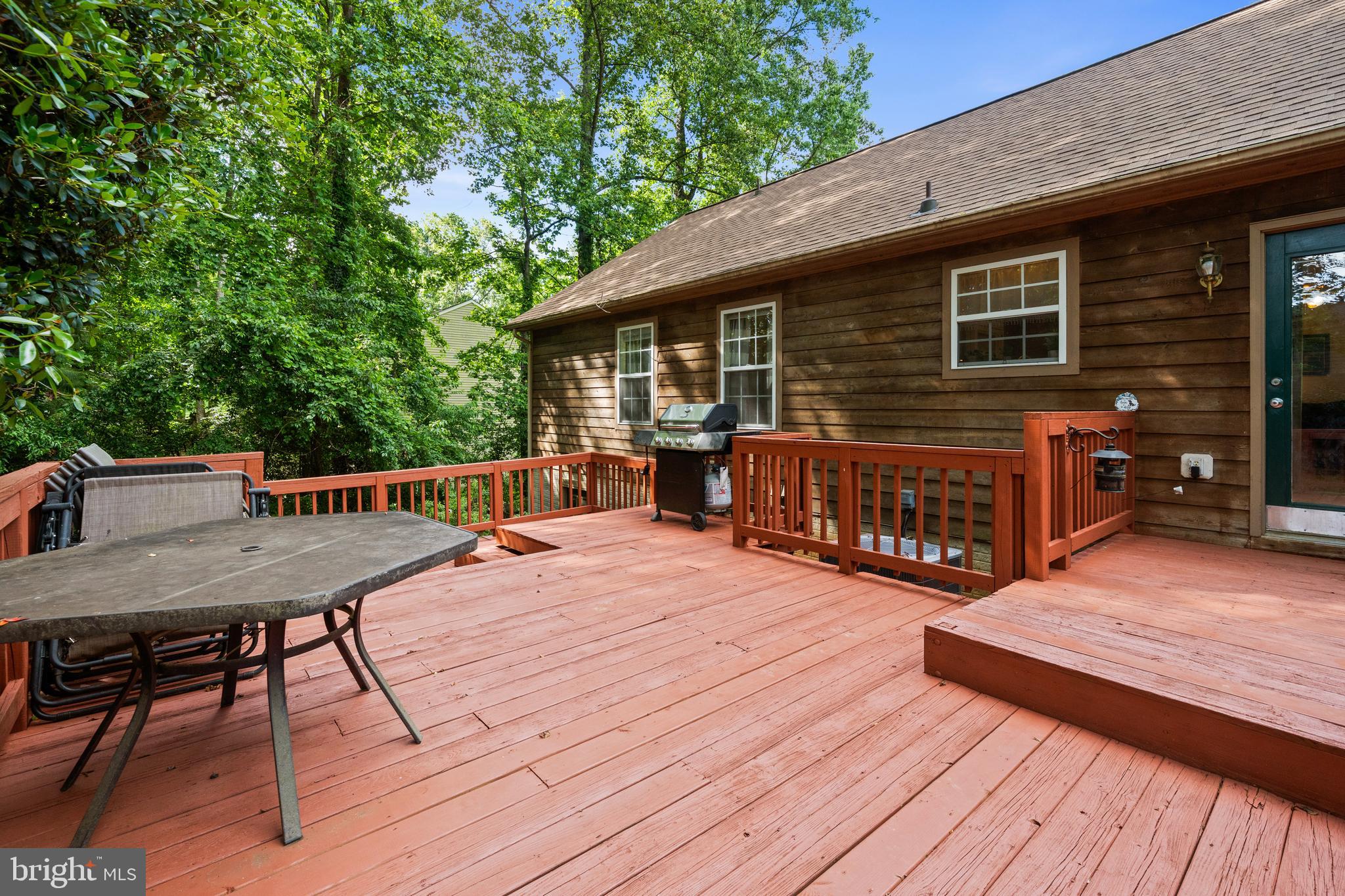 1127 Garner Drive King George, VA 22485 - Photo 25 of 39 a balcony with wooden floor table and chairs