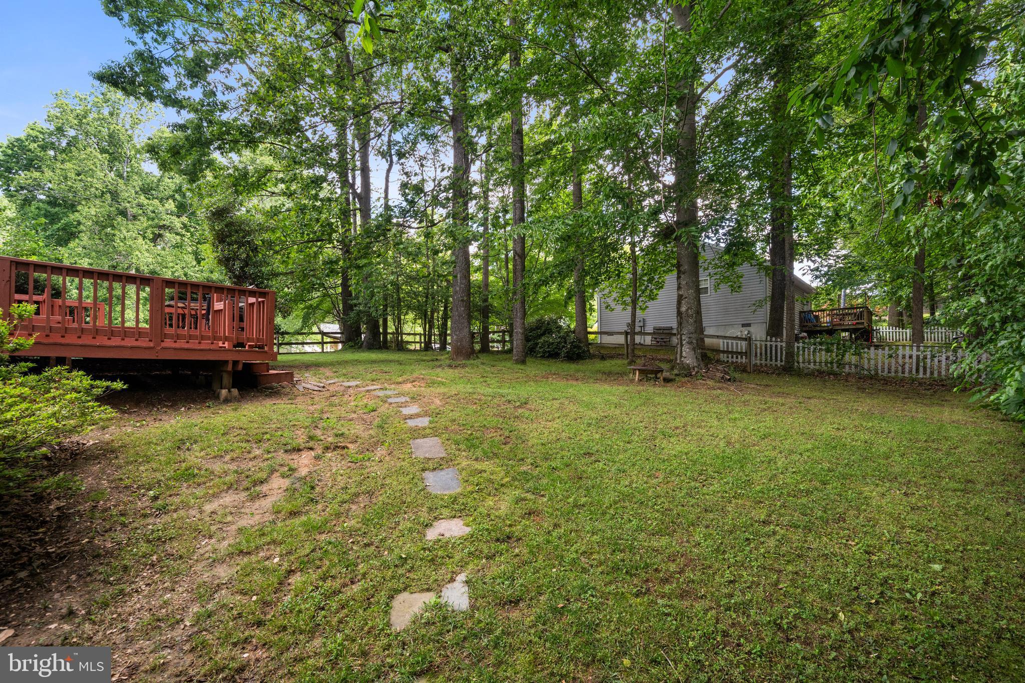 1127 Garner Drive King George, VA 22485 - Photo 28 of 39 a view of a house with backyard and sitting area
