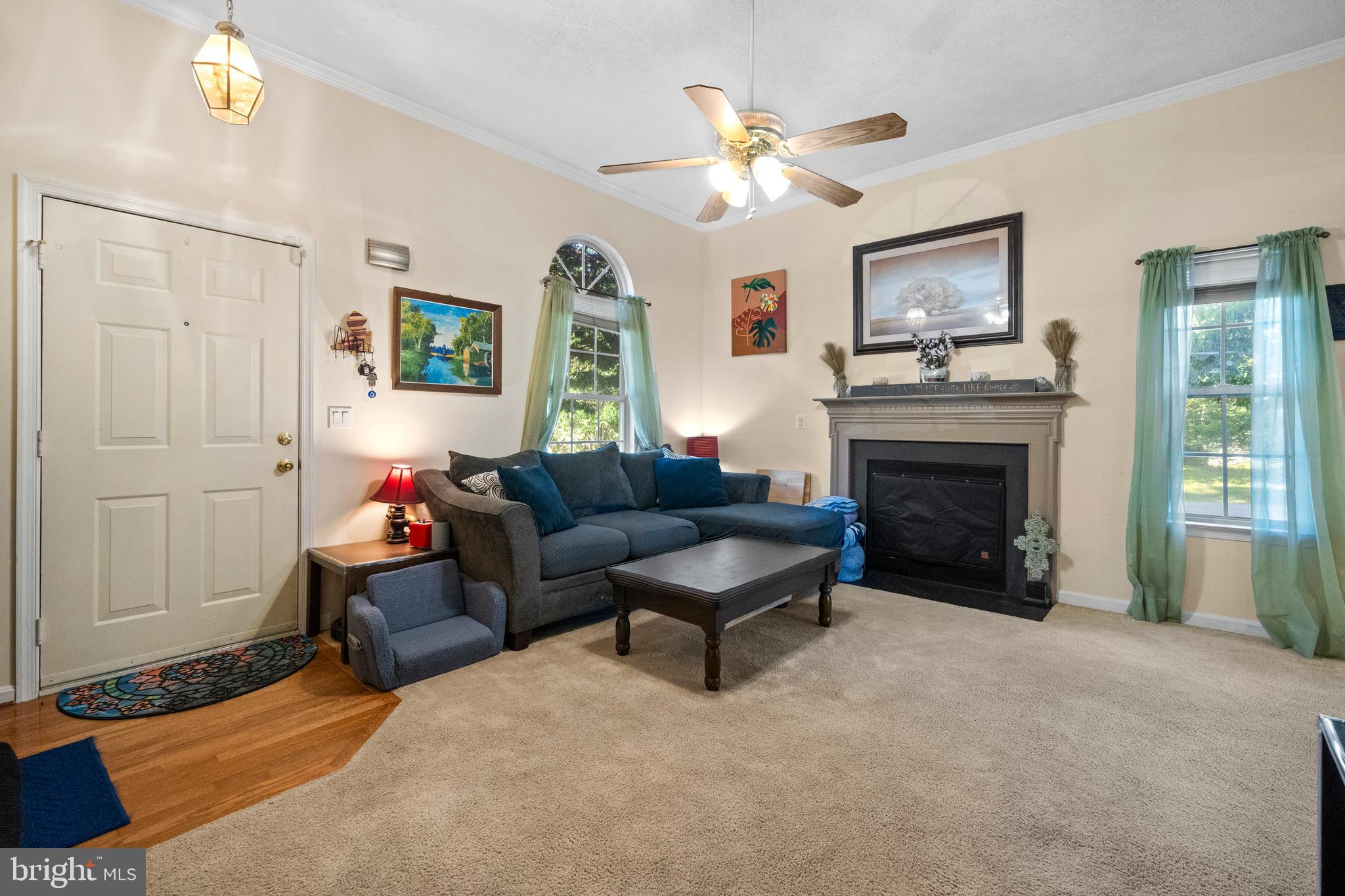 1127 Garner Drive King George, VA 22485 - Photo 4 of 39 a living room with furniture and a fireplace