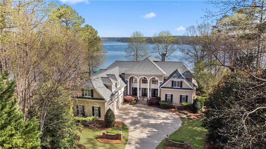 aerial view of a house with a yard