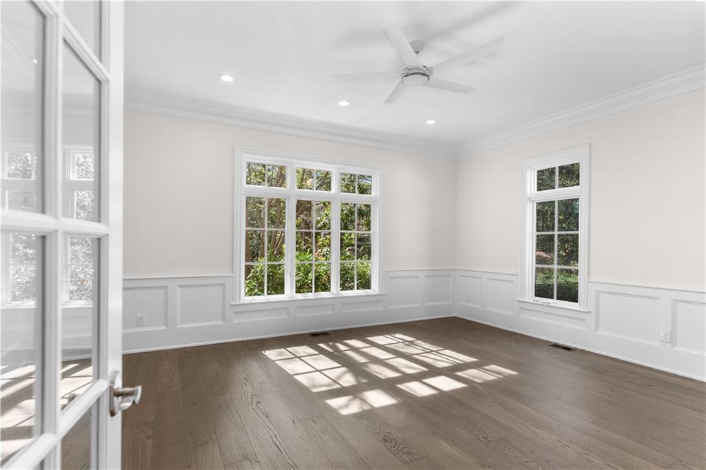 1070 Prosperity Point Greensboro, GA 30642 - Photo 14 of 38 an empty room with wooden floor and windows