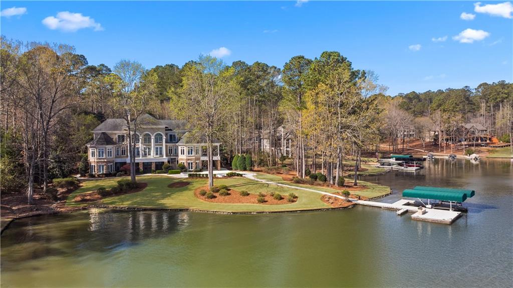 1070 Prosperity Point Greensboro, GA 30642 - Photo 2 of 38 a view of a lake with houses
