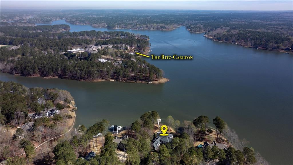 1070 Prosperity Point Greensboro, GA 30642 - Photo 3 of 38 an aerial view of a house with a lake view