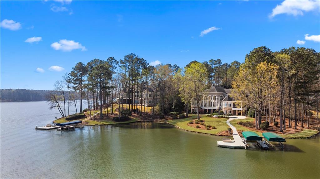 1070 Prosperity Point Greensboro, GA 30642 - Photo 7 of 38 a view of a lake with houses