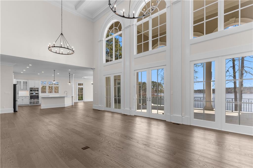 1070 Prosperity Point Greensboro, GA 30642 - Photo 10 of 38 a view of an entryway with wooden floor and a window