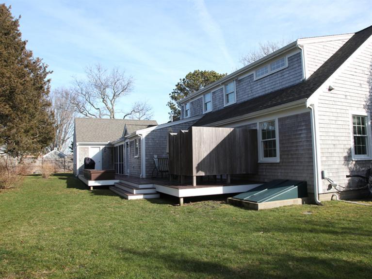 69 Goodview Way Barnstable, MA 02630 - Photo 13 of 17 a view of backyard with a garden