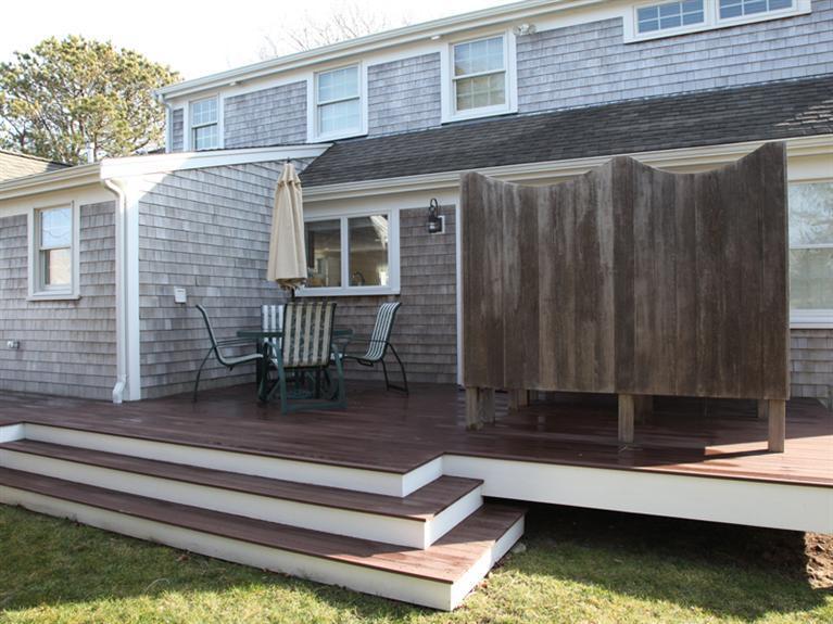 69 Goodview Way Barnstable, MA 02630 - Photo 15 of 17 a view of backyard with deck