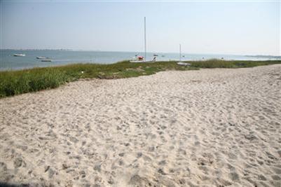 69 Goodview Way Barnstable, MA 02630 - Photo 16 of 17 a view of a lake with a beach