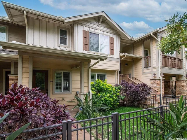 front view of a house with a small yard
