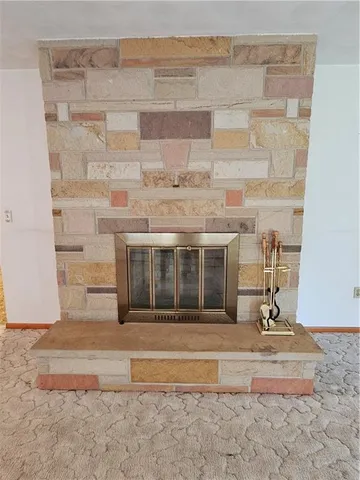 a view of a fireplace with an empty space