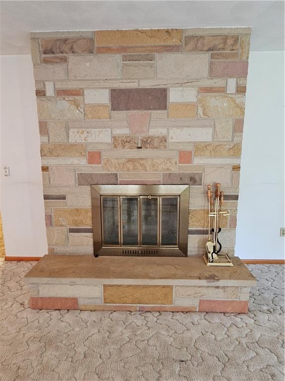 595 Wachob Road Punxsutawney, PA 15767 - Photo 11 of 50 a view of a fireplace with an empty space