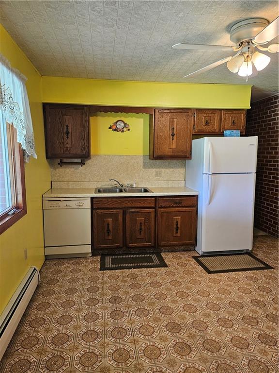 595 Wachob Road Punxsutawney, PA 15767 - Photo 15 of 50 a kitchen with a stove top oven cabinets and a refrigerator