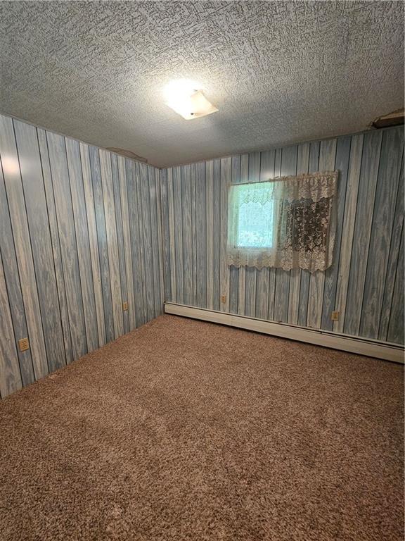 595 Wachob Road Punxsutawney, PA 15767 - Photo 17 of 50 a view of an empty room with wooden floor