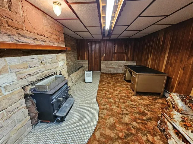 a view of a backyard with sitting area