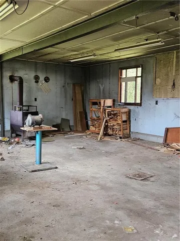 a house view with a play ground in front of it