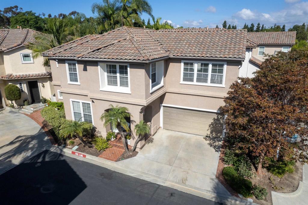 7189 Tanager Drive Carlsbad, CA 92011 - Photo 25 of 31 a aerial view of a house with a yard and potted plants