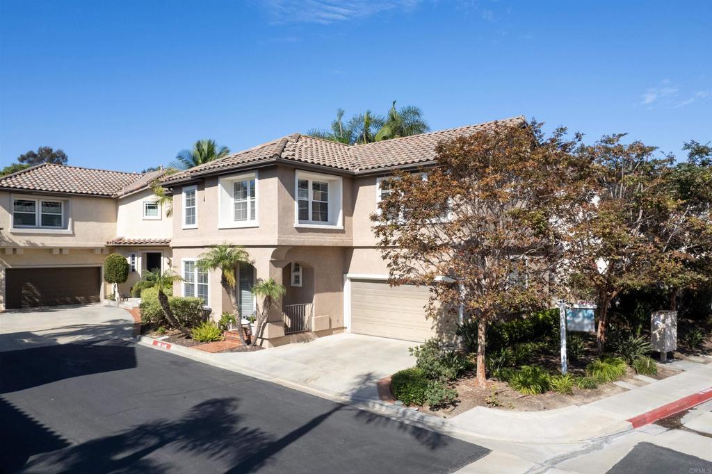 7189 Tanager Drive Carlsbad, CA 92011 - Photo 27 of 31 a front view of a house with a yard