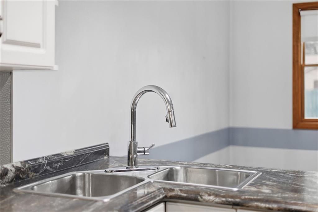 2757 Edith Street Lower Burrell, PA 15068 - Photo 8 of 47 View of counter modern counter top and corner stainless steel sink.