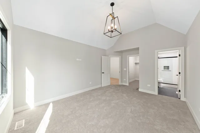 a bathroom with a double vanity sink and mirror