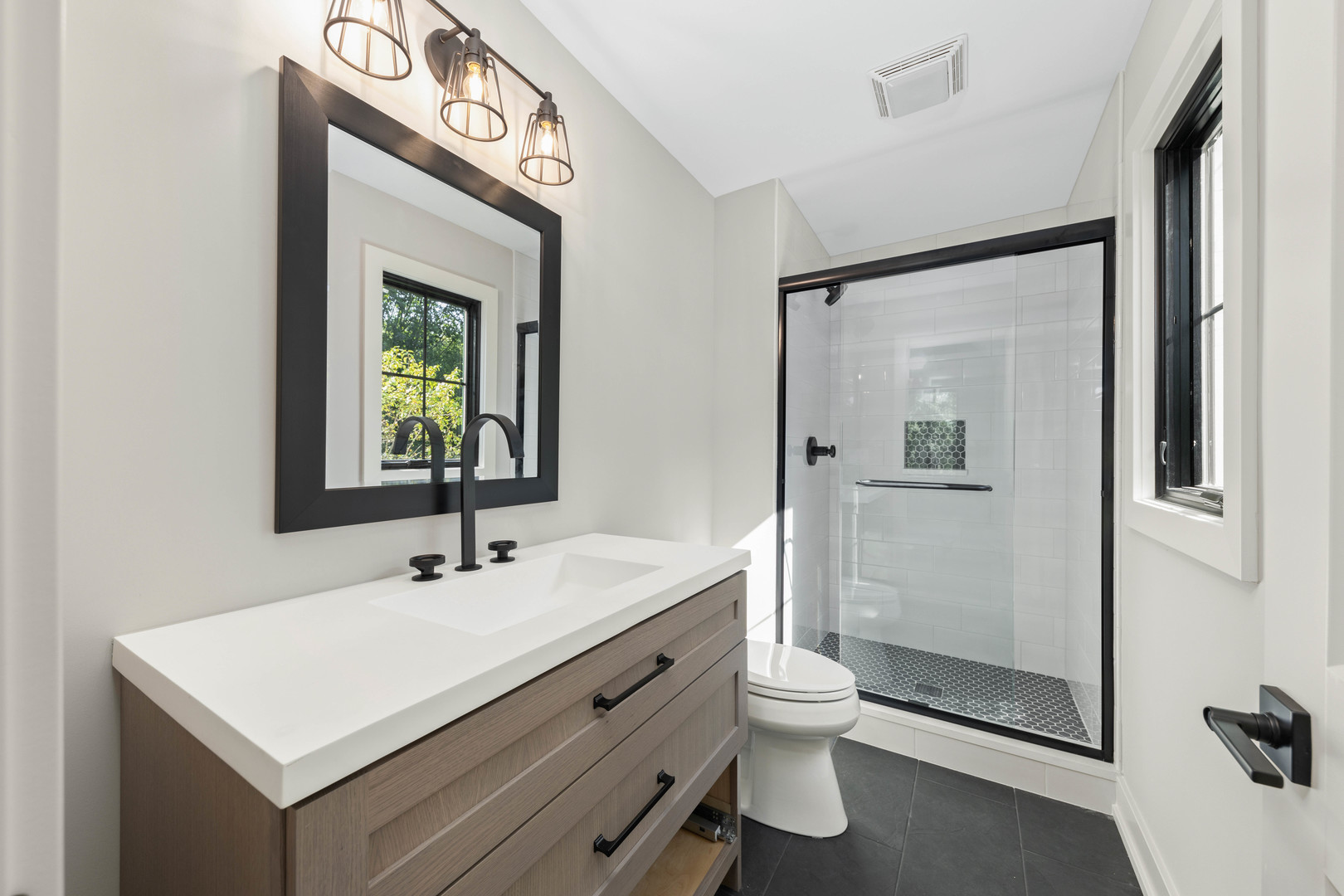 1314 Eagle Street Naperville, IL 60563 - Photo 23 of 26 a bathroom with a sink a toilet and shower