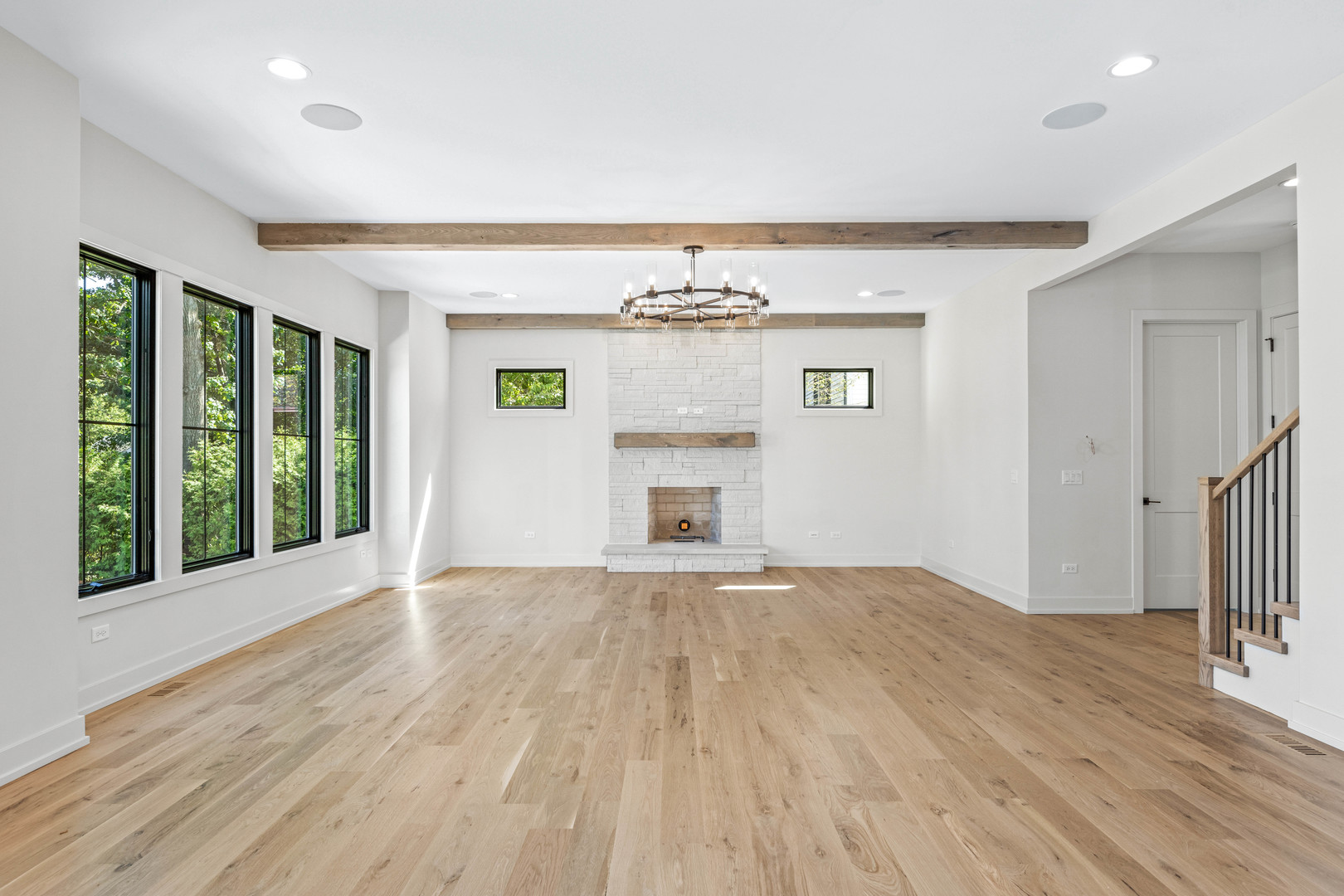 1314 Eagle Street Naperville, IL 60563 - Photo 3 of 26 a view of an empty room with a window and wooden floor