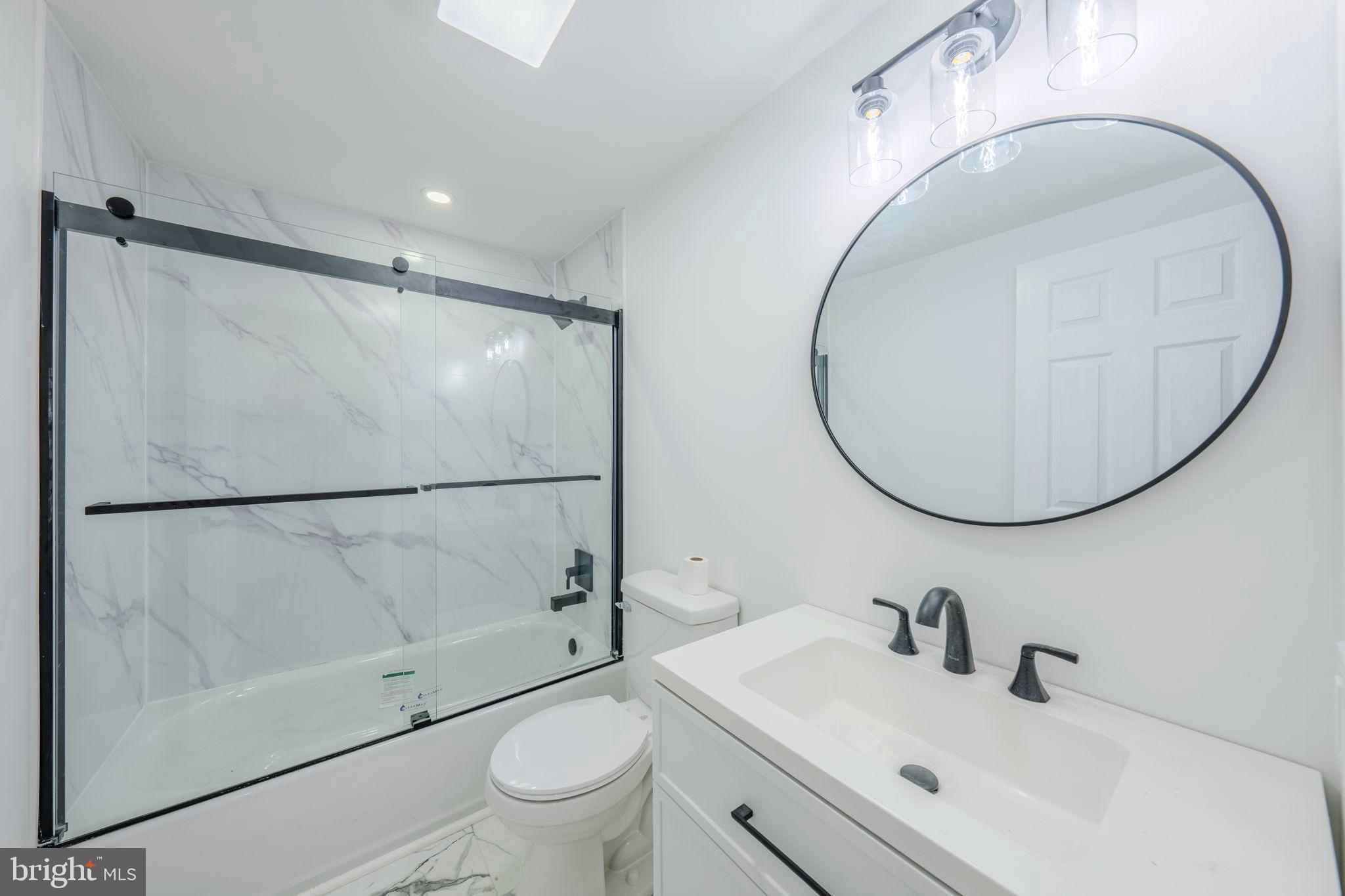 66 Rocky Ridge Road Quakertown, PA 18951 - Photo 14 of 42 Sleek modern bathroom with elegant finishes.