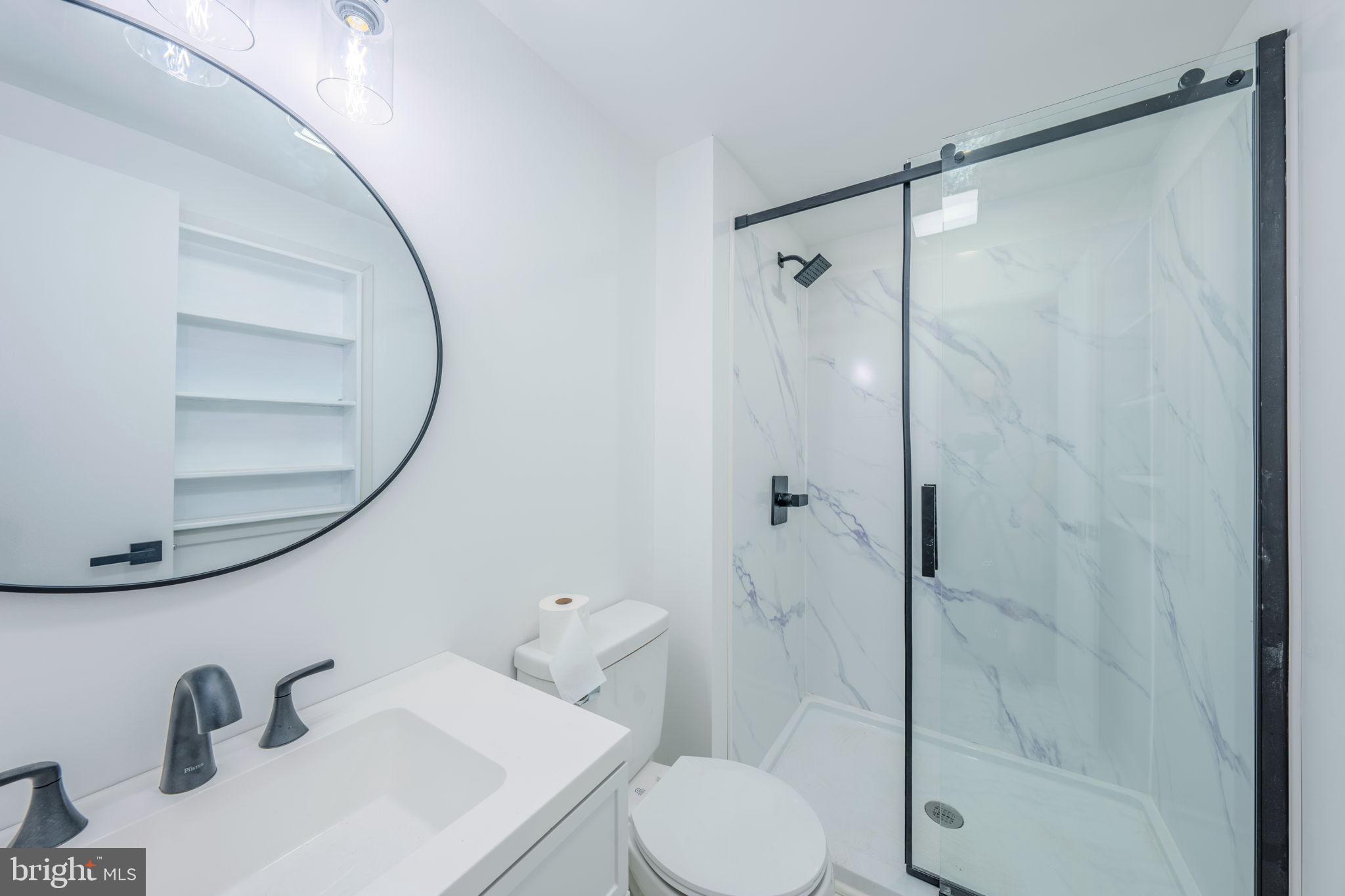 66 Rocky Ridge Road Quakertown, PA 18951 - Photo 15 of 42 Sleek modern bathroom with elegant finishes.