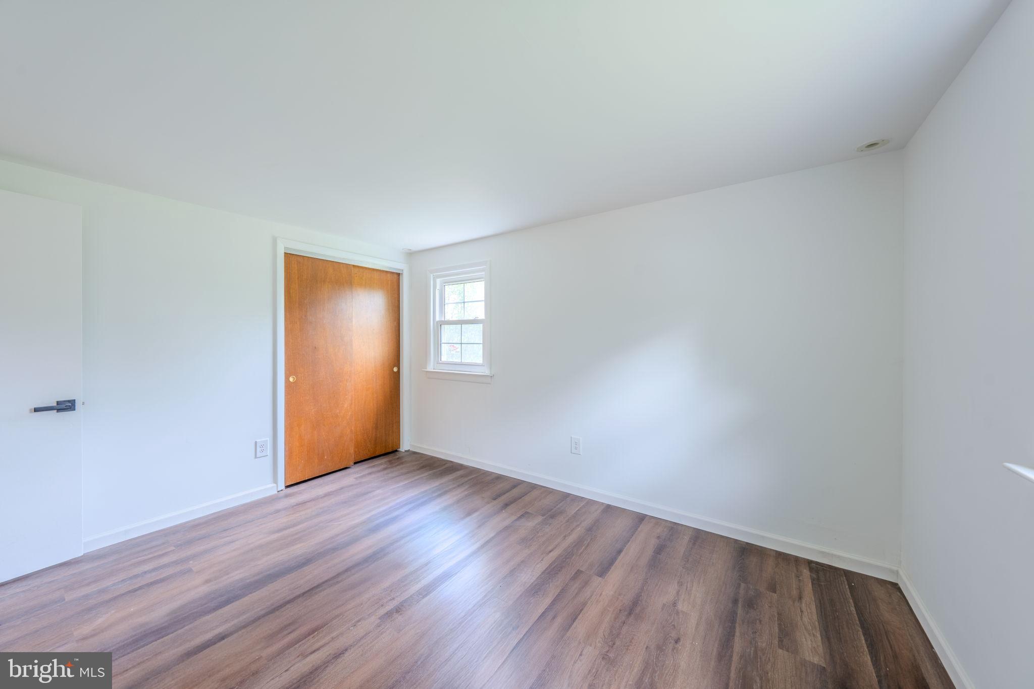 66 Rocky Ridge Road Quakertown, PA 18951 - Photo 16 of 42 Bright and airy space with warm wood floors.