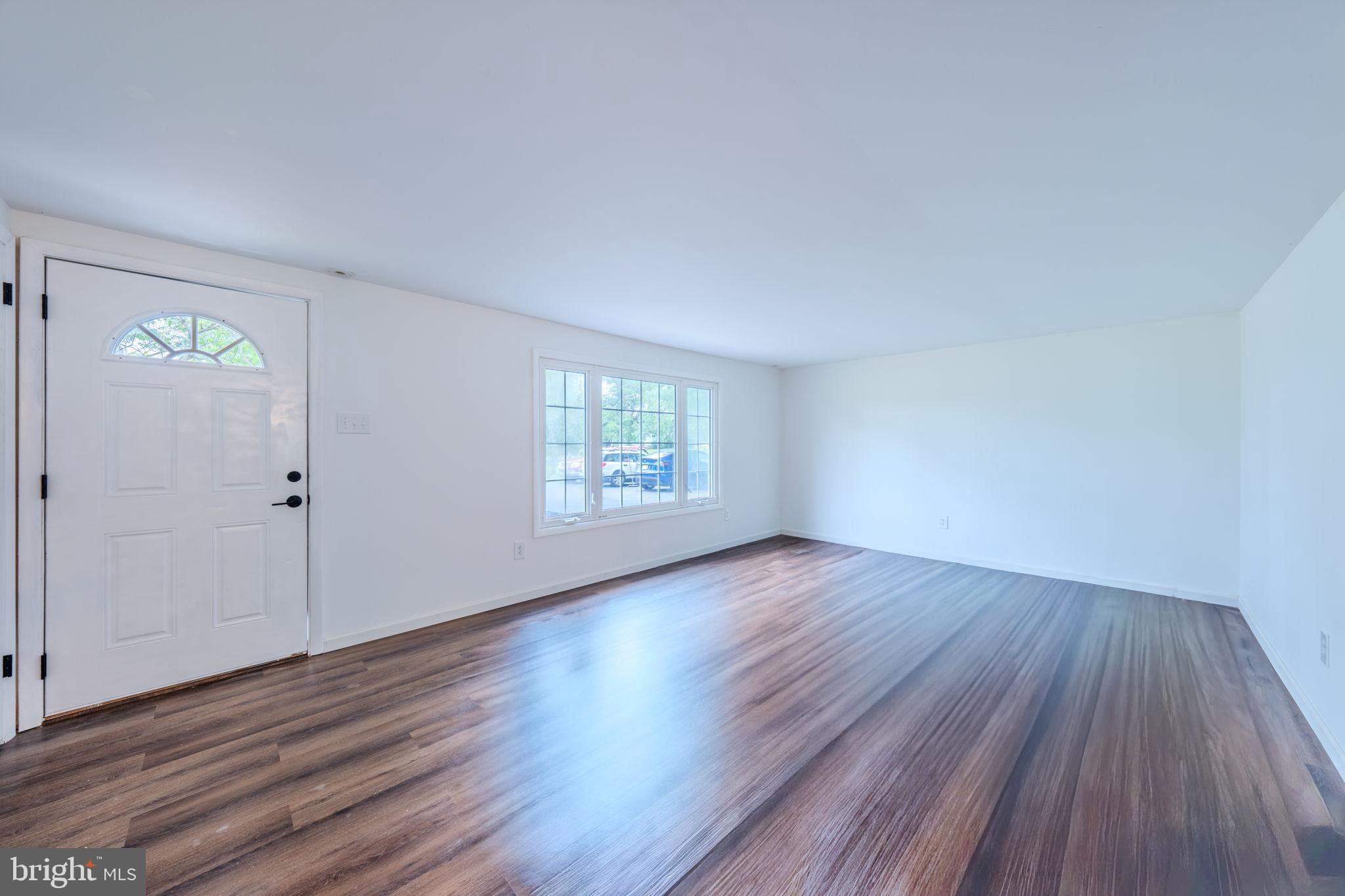 66 Rocky Ridge Road Quakertown, PA 18951 - Photo 2 of 42 Bright and spacious entryway with hardwood floors.