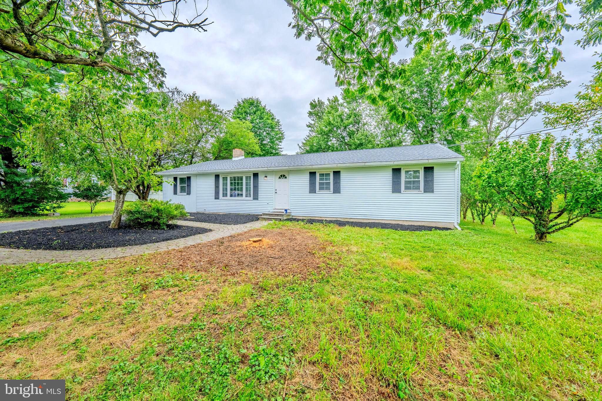 66 Rocky Ridge Road Quakertown, PA 18951 - Photo 26 of 42 Charming home nestled in lush greenery.