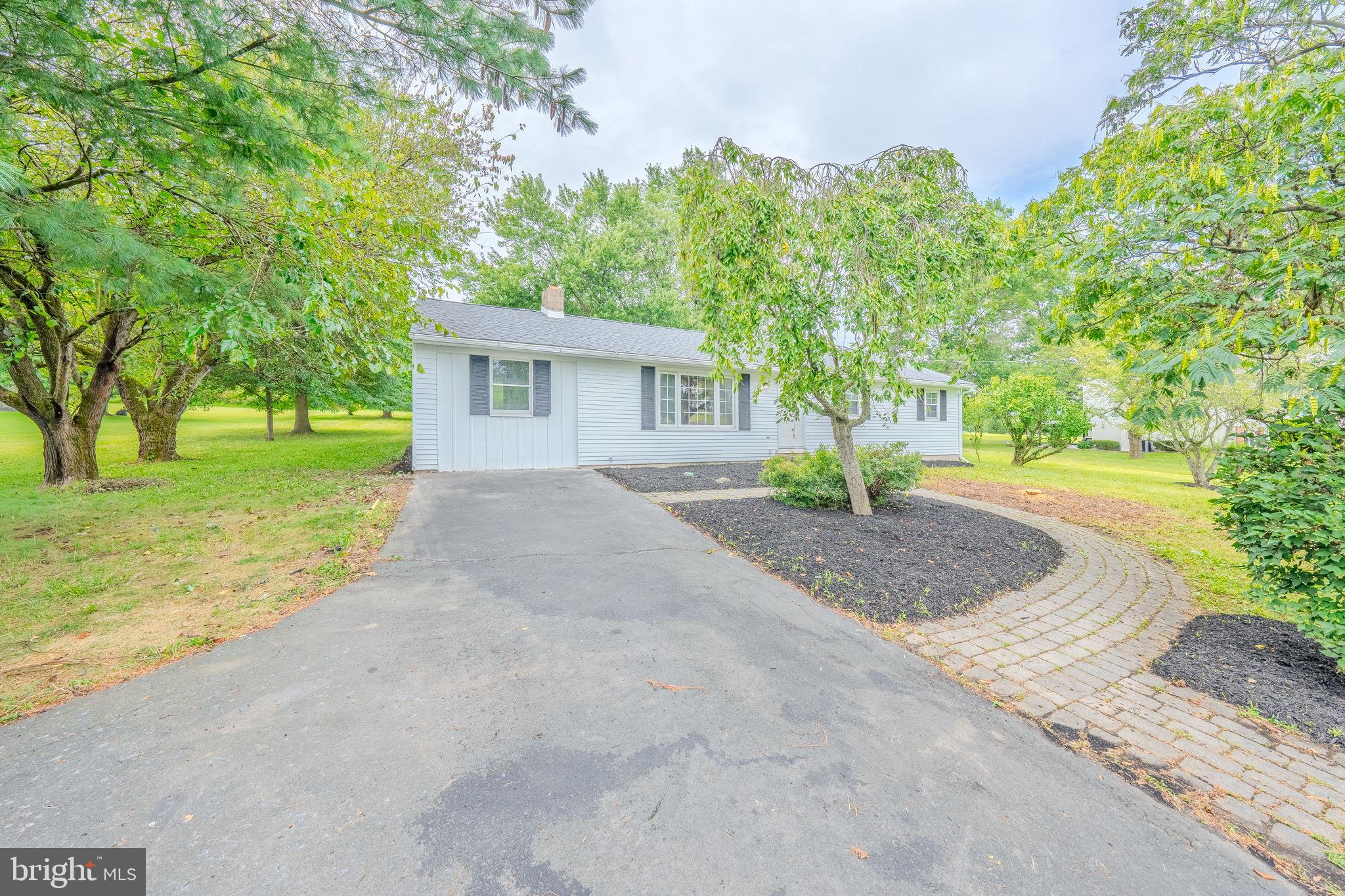 66 Rocky Ridge Road Quakertown, PA 18951 - Photo 27 of 42 Charming home nestled in lush greenery.