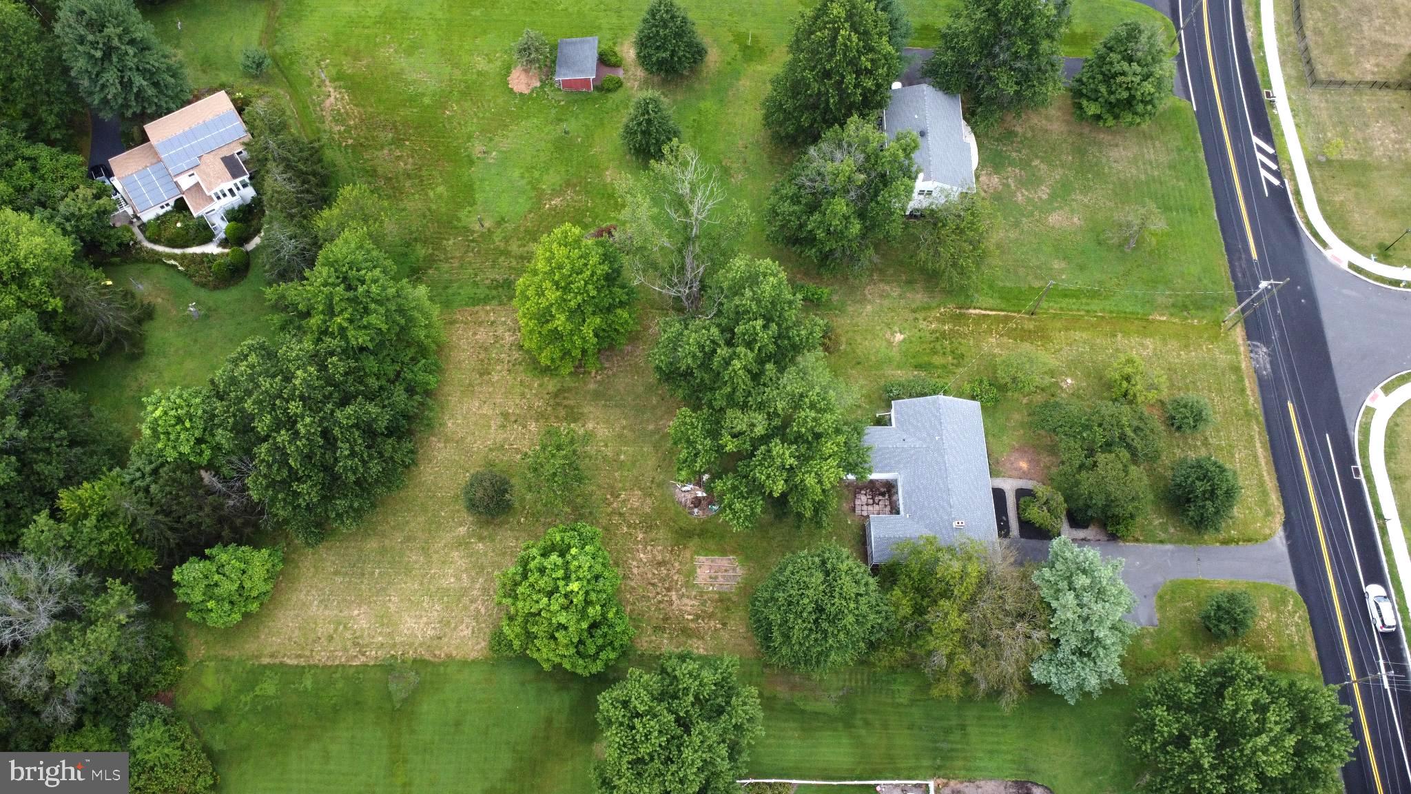 66 Rocky Ridge Road Quakertown, PA 18951 - Photo 35 of 42 Lush greenery surrounds charming homes.